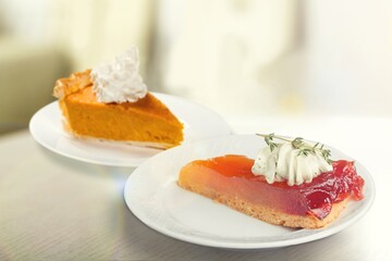 Thanksgiving pie or cake slices on plate