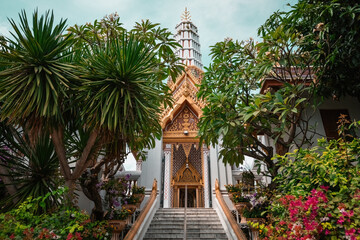 Fototapeta na wymiar Traditional Thai temple in the beautiful garden in Bangkok Thailand