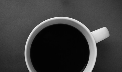 Coffee cup on grey background.