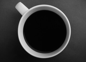 Coffee cup on a grey background.