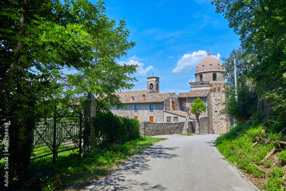 Poster beautiful view of the church of san nicola near solferino, below the castle tower of la rocca. lomba