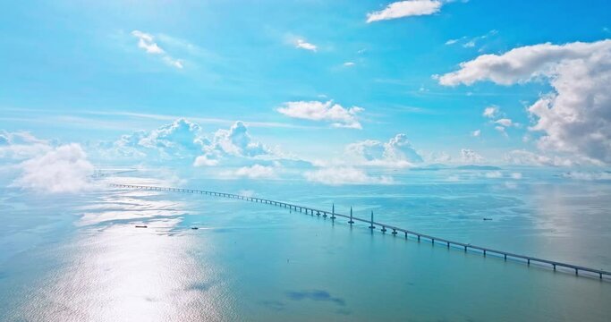 Aerial shot of Hong Kong-Zhuhai-Macao Bridge and natural scenery at sunrise