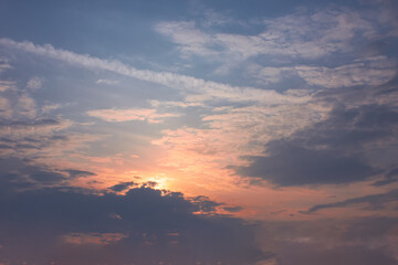 Obraz premium Beautiful sky background - Sunset Sunrise sky with light clouds and real sun.