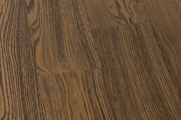 Texture of natural oak parquet. Wooden boards for polished laminate. Background of blank hardwood floor
