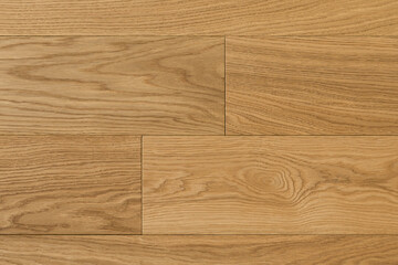 Texture of natural oak parquet close-up. Wooden boards for polished laminate. Hardwood sample background