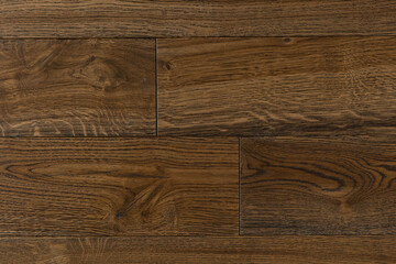 Texture of natural brown oak parquet close-up. Wooden boards for polished laminate. Hardwood sample...