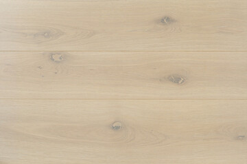 Obraz na płótnie Canvas Texture of natural ivory oak parquet. Wooden boards for polished laminate. Hardwood background