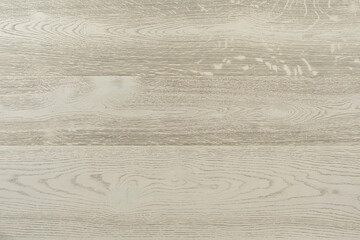 Texture of natural ivory oak parquet. Wooden boards for polished laminate. Hardwood background