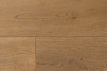 Fototapeta na wymiar Texture of natural oak parquet close-up. Wooden boards for polished laminate. Hardwood sample background