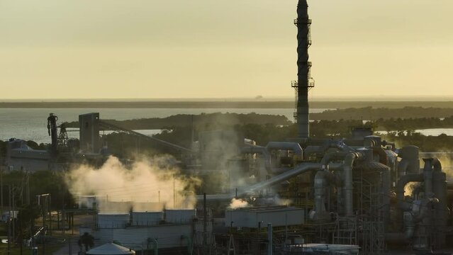Factory for handling and processing of phosphates emitting toxic vapors polluting air. Mosaic Riverview Plant in Tampa, Florida. Industrial facility for chemical production of phosphoric acid