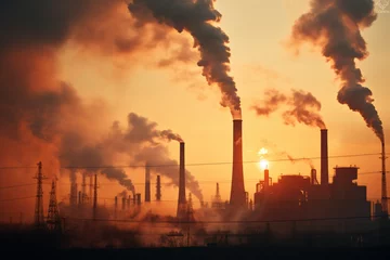 Zelfklevend Fotobehang Industrial landscape with heavy pollution produced by a large factory. Ambient air pollution environmental industrial emissions. Industry zone, thick smoke plumes. Climate change, ecology © Valeriia