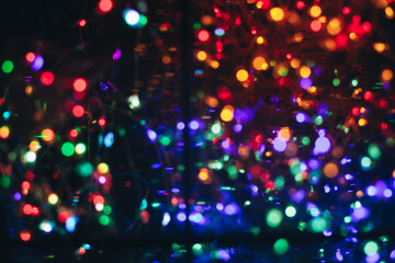 Fototapeta premium texture of christmas colored lights glowing