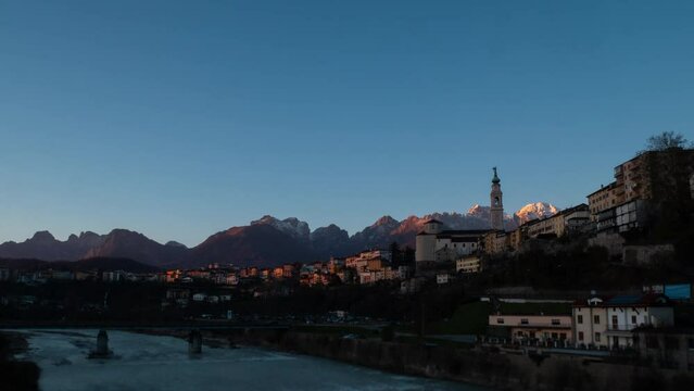 Belluno City time lapse from sunset to night, Veneto, Italy