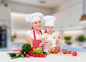 Young woman cooking food at home
