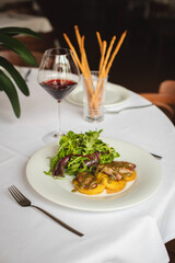 Stylish serving of food in the restaurant. Serving. Waiter