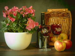 Still life with Begonia flower and fruits apples and pomegranates. - 688219202