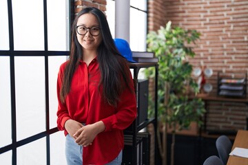 Young chinese woman business worker smiling confident at office