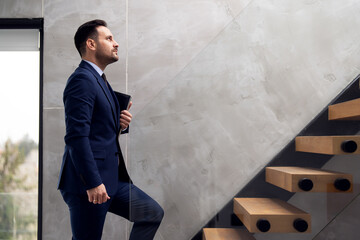Ambition businessman walk up stairs