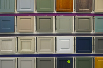 wood cabinet door samples in market in a row - obrazy, fototapety, plakaty