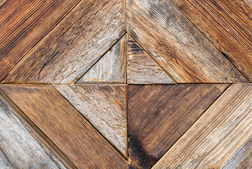 Wooden background. Brown gray background with shades of white in the form of four squares.