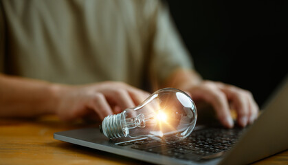 Creative idea. Concept of idea and innovation, Businessman holding light bulb. Idea concept with...