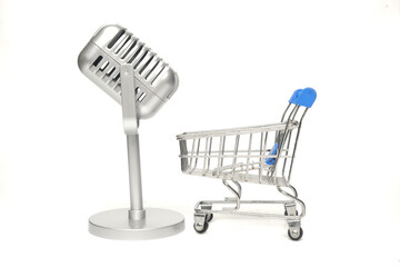 A picture of classic microphone with toy cart on isolated white background.