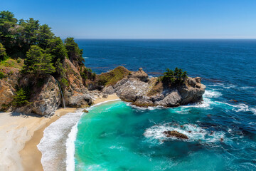 Beautiful California beach with rocks and turquoise sea. Julia Pfeiffer beach, Big Sur. California, USA	