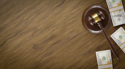 Overhead of Gavel Resting on a Table and Stacks of Thousands of Dollars with Room For Text.