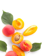 Sweet apricots and leaves on white background