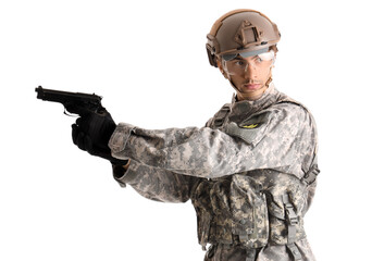 Fototapeta premium Young male soldier with gun isolated on white background