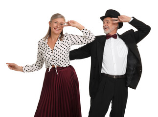 Senior couple dancing together on white background