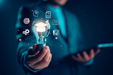 E-learning graduate certificate program concept. man holding lightbulb showing graduation hat,...