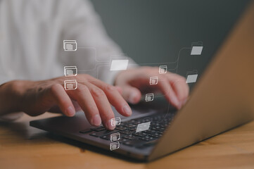 Online document, document management system (DMS), business process automation technology. Businessman working with document icon on virtual screen. File storage and archiving. ERP. Folder structure.