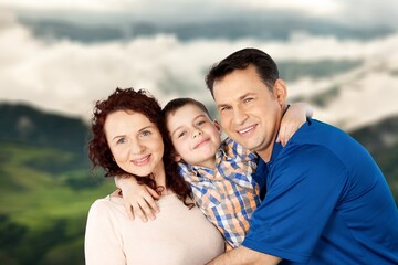 Obraz premium Happy young family have fun in the garden