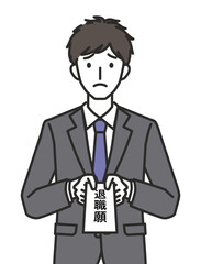 退職願を提出する男性