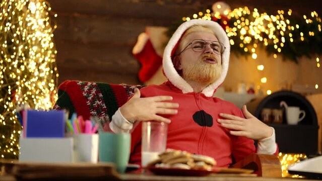 Santa Claus at home. New Year Holiday. Merry Christmas and New Year Eve concept. Holly jolly xmas noel. Crazy Santa Claus sing rap or Hip Hop. Funny Repper.