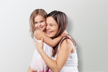 Young mom hold cute happy baby