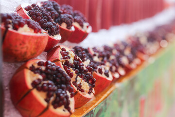 Zoom in on these pomegranates ready to be juiced on the table
