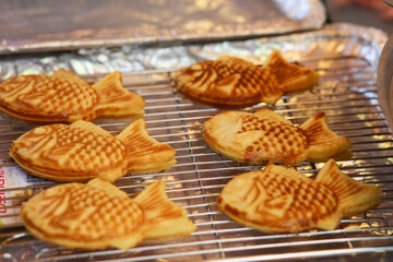 Closeup of Taiyaki Grilled Fish Cake with Cheese Filling in the food festival