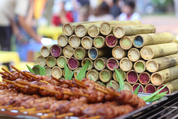 Closeup of colorful bamboo tube rice on the street in Vietnam