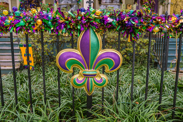 Mardi Gras decorations in the French Quarter in New Orleans in the colors of purple, gold and green. © Heidi Besen