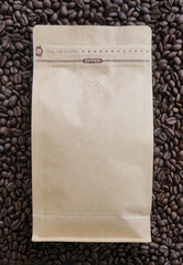 Bag of roasted coffee beans with empty space on a rich dark coffee background