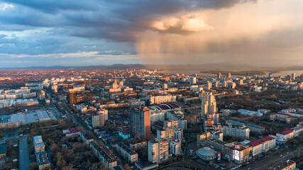 Fototapeta na wymiar Khabarovsk city top view sunset beautiful clouds in the rain