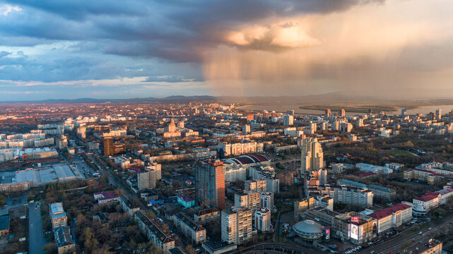 Khabarovsk city top view sunset beautiful clouds in the rain © suvorovalex