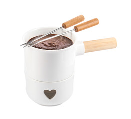 Fondue pot with melted chocolate and forks isolated on white