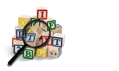 English alphabet with magnifying glass, study concept