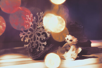 Chinese new year decorations with  cute figurine baby dragon and glittering silver snowflake....