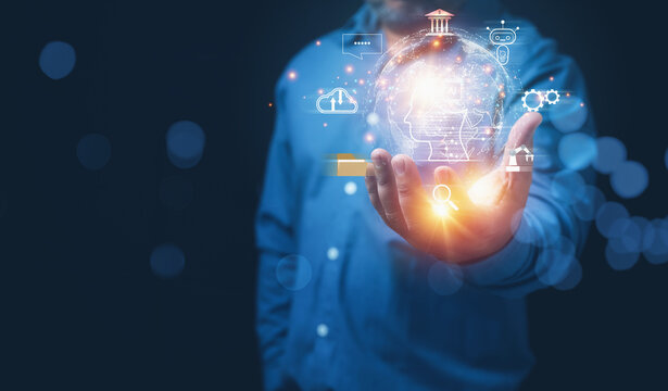 Businessman hold virtual screen of Artificial intelligence, AI circuit board with chatbot in virtual the world. AI is innovation smart robot to assistant support big data. Science, technology concept. - Powered by Adobe