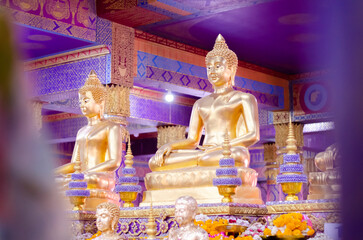 golden Buddha statue in church at Wat Bang Chak in Nonthaburi Province in Thailand. Located along...