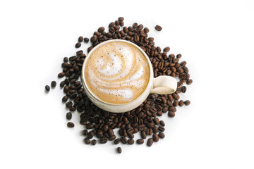 Cafe latte with foam design with scattered coffee beans on white background
